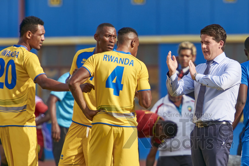 Coach McKinstry speaks to players following Tuyisenge's first equaliser. [Rwanda v Mozambique, AFCON 2017 Qualifier, 4 June 2016 in Kigali, Rwanda.  Photo © Darren McKinstry 2016, www.XtraTimeSports.net]